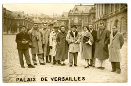 Postcard with exterior group portrait of eleven men and women at the Palais de Versailles. From the collection of the Workmen's Circle of Montreal.