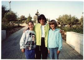 Shaffer posed with Asya and unidentified girl outdoors, likely in Jerusalem