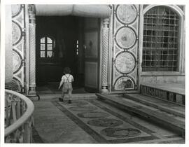 Shot of a young boy walking into a Mosque in Acre