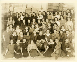 Interior, Washmor Frocks Co. Group portrait, employees. Hyman Rafman, Lily Rafman.