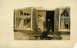 Exterior, The Roback family on the steps of the store, Beauport.